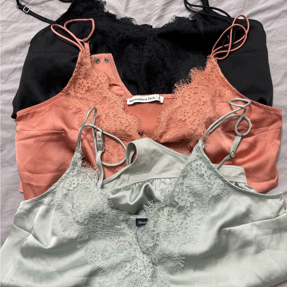 Abercrombie and Fitch Bodysuits (3 included) Size Medium.